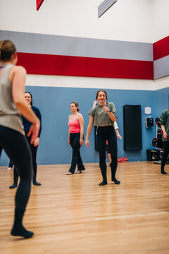 Women group exercising together in dance studio