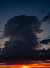 Fototapeta premium Evening colors show off a giant cloud formation.