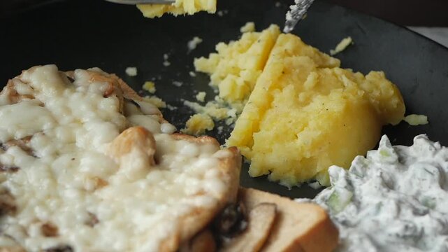Lunch with mashed potatoes and cheese on toast