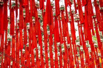 Chinese red bands with prayers in one of the Hangzhou temples © Tatiana Kashko