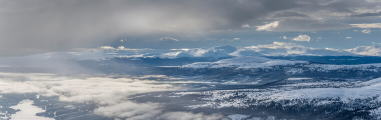 Fototapeta premium panorama of snowy mountains in Åre, Sweden in winter