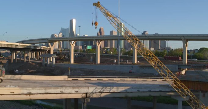 Establishing Drone View of Downtown Houston from I-45 North Freeway ascending from Construction Site