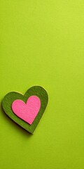 Obraz premium Heart Shapes on Vibrant Green Background, Artistic Display, DIY Project, Whimsical Vibe