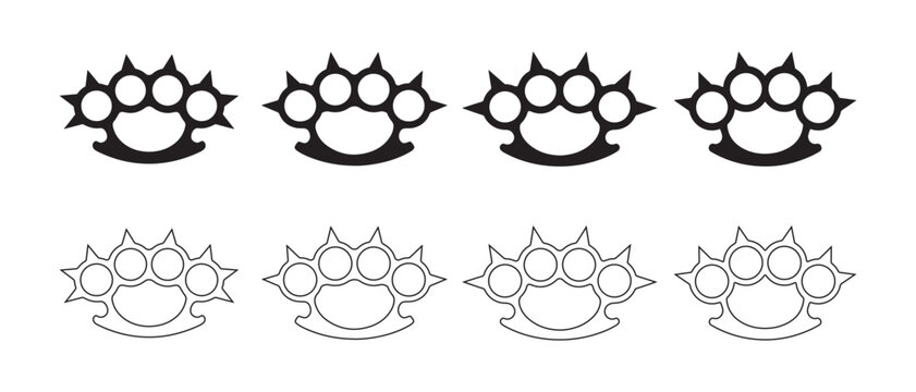Set of black and white brass knuckles icons isolated on a white background for design.