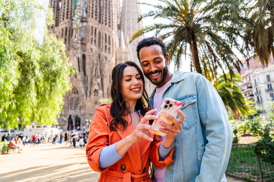 Multiracial beautiful happy couple of lovers dating in Barcelona