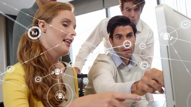Seated man pointing at screen, business team reviewing data, overlay growing, mapping workflow