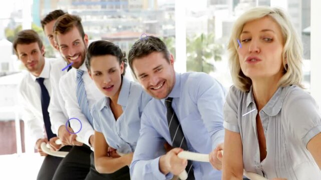 Business team pulling thick rope, purple overlays appearing and sparking stronger teamwork pull