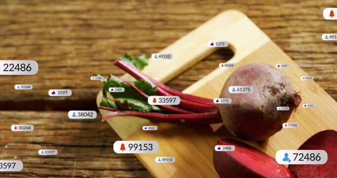 Alerts launching heart and bell badges across table, clustering over beets for food marketing