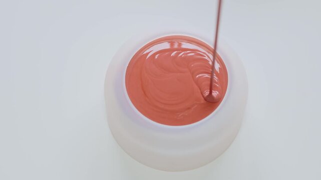 Top View Coral Cream Blush In White Jar On Minimal White Background Beauty Skincare Product