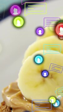 Vertical video: Start chat bubbles appearing and drifting over banana, panning right showing alerts