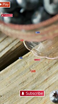 Vertical video: Bowl of berries nearing, Subscribe appearing, icons rising, cursor clicking for ads