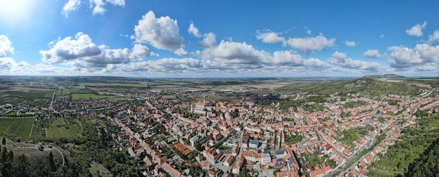 Aerial view of the historic center of Mikulov and the pilgrimage site of Svat&yacute; Kopeček. Sunny day with partly cloudy sky. Czech Republic, South Moravia.