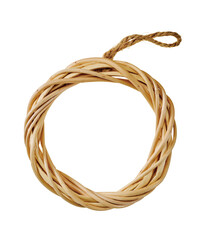 Small natural vine wreath with jute rope loop isolated on white background © sawa