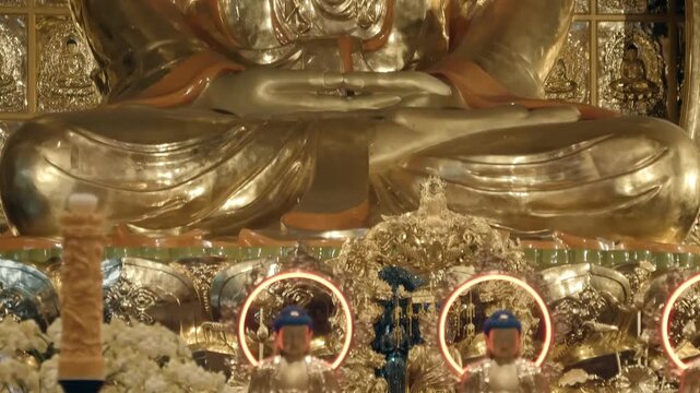 Massive golden Buddha statue in the temple of  Viet Nam Quoc Tu Pagoda (Vietnamese National Pagoda) in Saigon