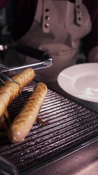 Juicy sausages grilled on the grill