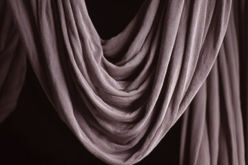 Fototapeta premium Sensory swing fabric draped in soft folds creates calming indoor therapy environment with gentle texture and soothing atmosphere for relaxation and comfort