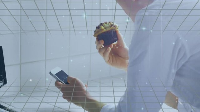 Animation of dots and digital space over caucasian man eating apple and using smartphone