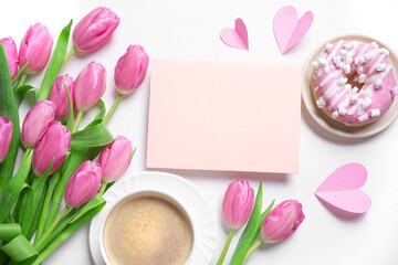 Empty blank greeting card, pink tulips, coffee and pink donut