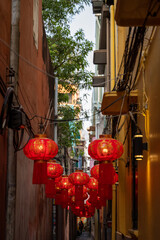 Narrow alley with red lanterns in old Bangkok © Ulysses