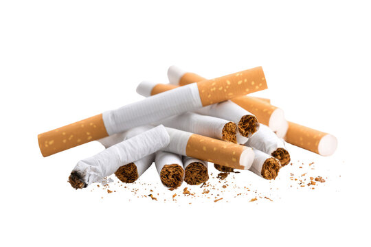 Scattered Cigarettes and Tobacco on White Surface - Health Implications