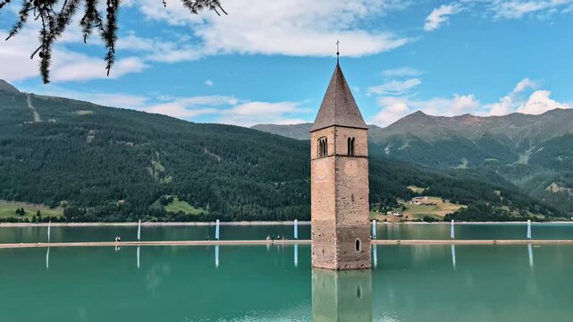 Sunken Bell Tower of Alt Graun in Lake Reschen South Tyrol Italy 4K