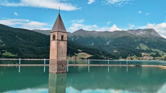 Sunken Bell Tower of Alt Graun in Lake Reschen South Tyrol Italy 4K