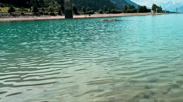 Sunken Bell Tower of Alt Graun in Lake Reschen South Tyrol Italy 4K