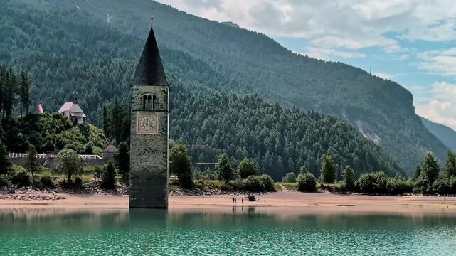 Sunken Bell Tower of Alt Graun in Lake Reschen South Tyrol Italy 4K