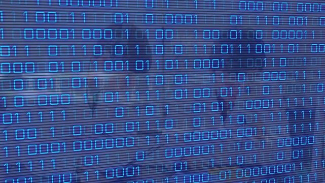 Animation of binary code and dna over blurred lab workers