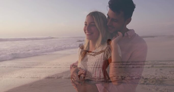 Couple embracing on beach at sunset, featuring floating business analytics chart and heart icon