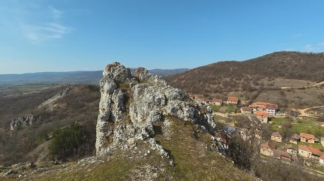 Rocky Hilltop Overlooking Village. Vrmdza, Mount Rtanj area. Balkans, Serbia.