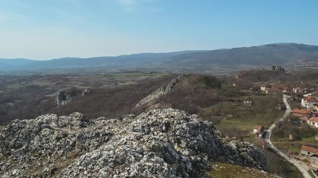 Rocky Hilltop Overlooking Village. Vrmdza, Mount Rtanj area. Balkans, Serbia.