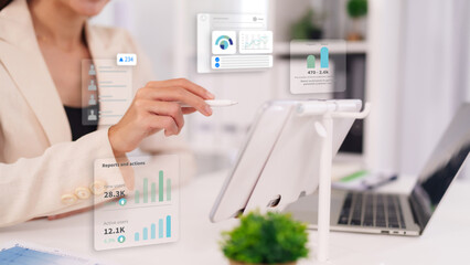 Fototapeta premium Businesswoman analyzes digital marketing data with futuristic UI dashboard for business growth strategy and performance review data analytics business intelligence technology