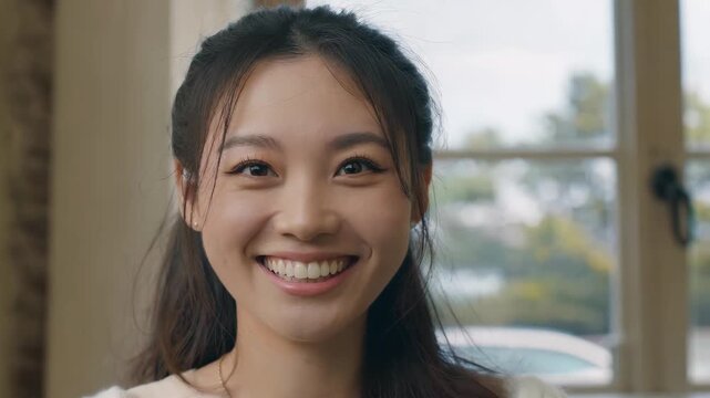Close-up footage of smiling women