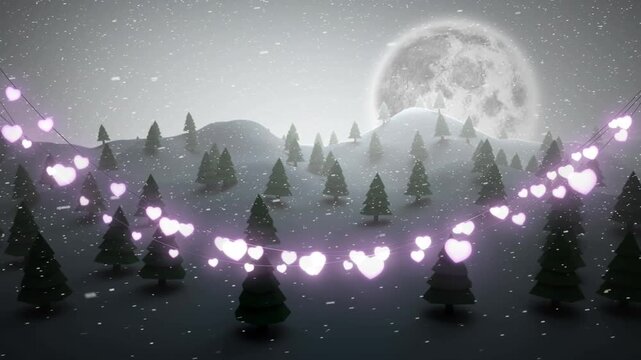 Glowing heart shaped fairy lights decoration against snow falling over winter landscape