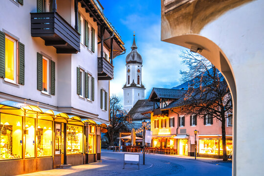 Alpine town of Garmisch Partenkirchen church and  street architecture evening view