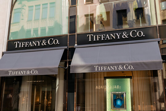 HAMBURG, GERMANY - MARCH 07, 2026: Tiffany & Co. luxury store facade with grey awnings and brand logos in downtown Hamburg