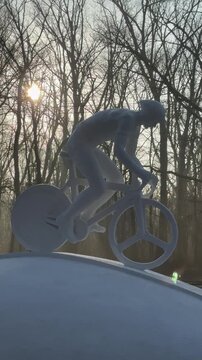 A cyclist at dawn