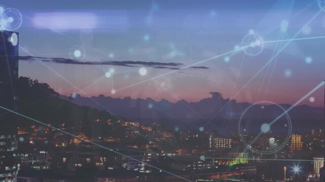Animation of network of connections against aerial view of cityscape at night