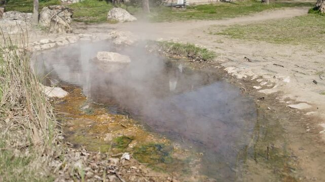 Geothermal mineral spring with steam at sacred Rupite site near Vanga temple Bulgaria