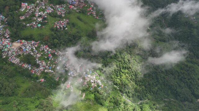 Aerial drone shot of misty hills in Darjeeling India cloudy weather 4K