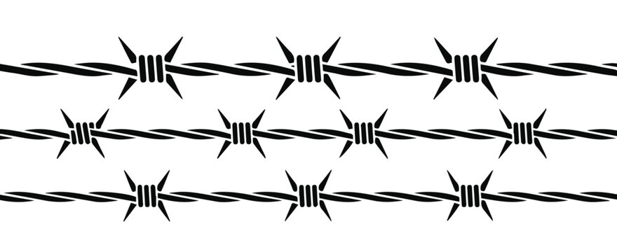 Barbed wire perimeter at prison yard