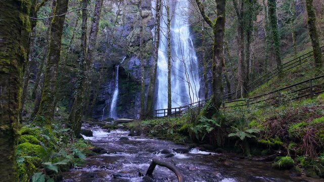 Scenic Seimeira de Vilagocende Waterfall In O Fito, A Fonsagrada, Spain - Drone Shot