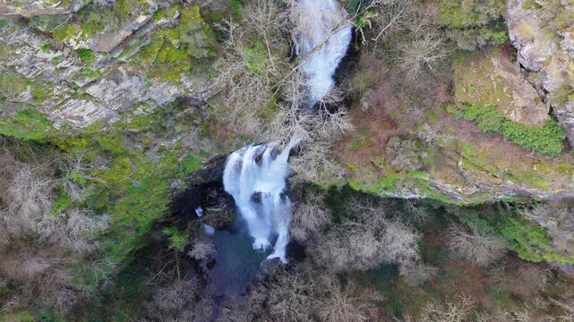Drone Shot Of Seimeira de Vilagocende Waterfall In O Fito, A Fonsagrada, Spain