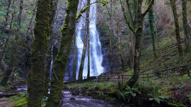 Beautiful Waterfall In O Fito, A Fonsagrada, Spain - Drone Shot