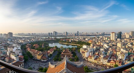 Obraz premium Panoramic view of Hanoi city with buildings and lake.