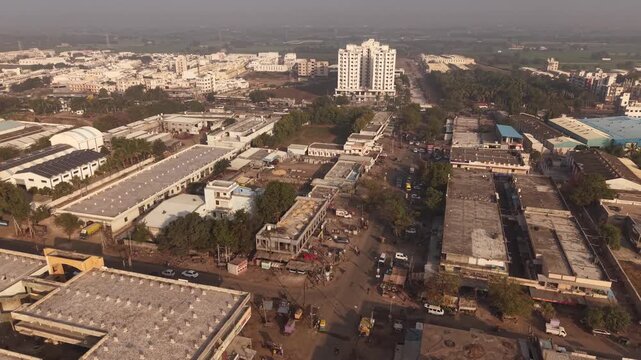 The environment from dusty brown earth of undeveloped plots to the lines of industrial architecture.