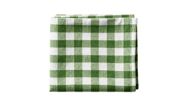 Isolated folded green and white checkered picnic blanket or tablecloth for home or restaurant