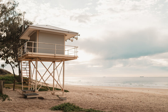 Lifeguard tower at the beach on peaceful morning with copy space