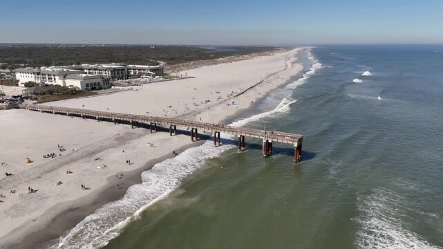 Aerial view of tourists at St Augustine beach pier near Anastasia State Park in St Augustine, Florida. 